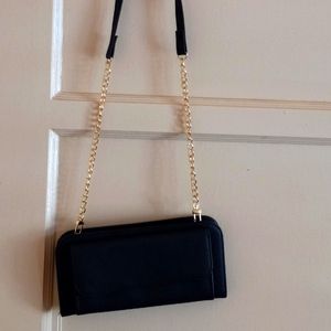 Black purse gold zipper black and gold chain